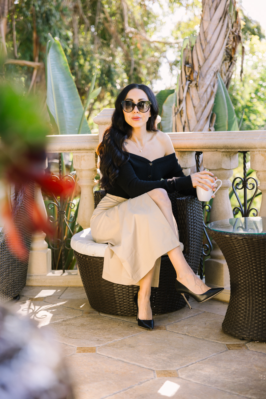 Elegant woman on garden terrace